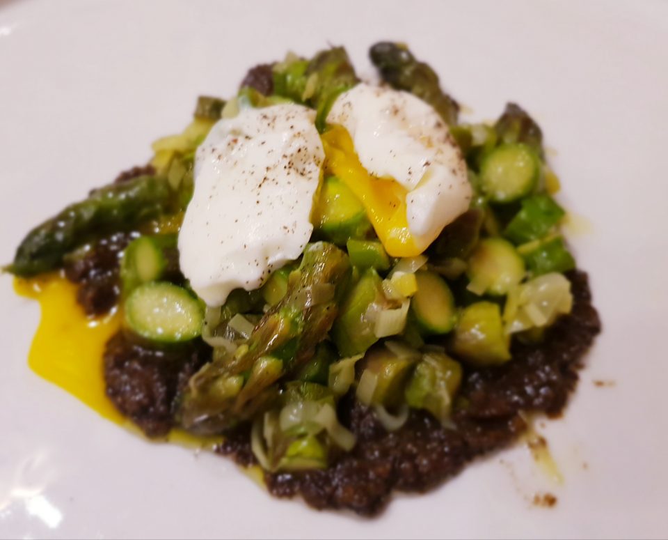 Poached Eggs on Wild Asparagus and Black Truffle Cream